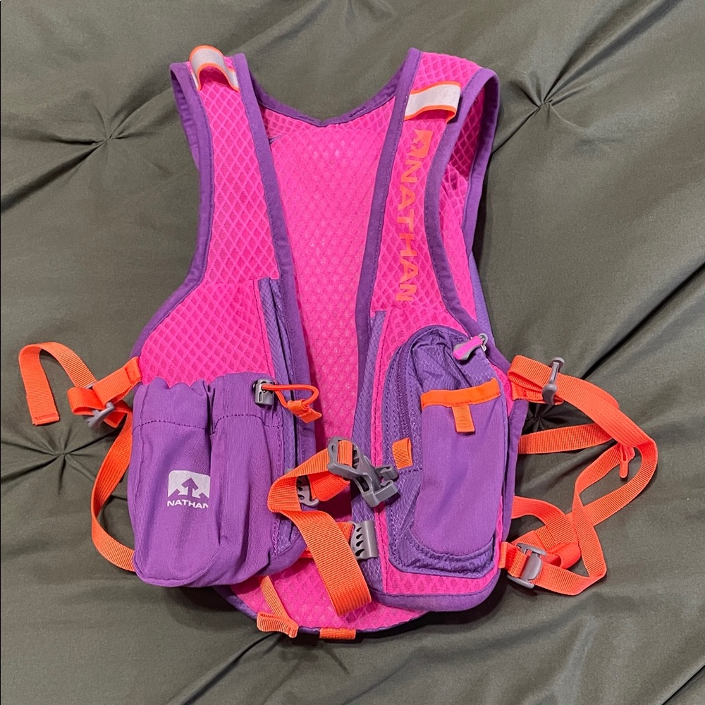 Nathan Pink, Purple & Orange Hydration Vest. Fits 2L bladder